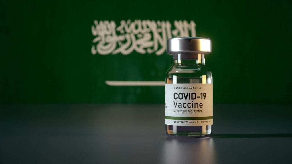 Corona Vaccine / Covid Vaccine Ampule / Vaccination in Saudi Arabia Flag