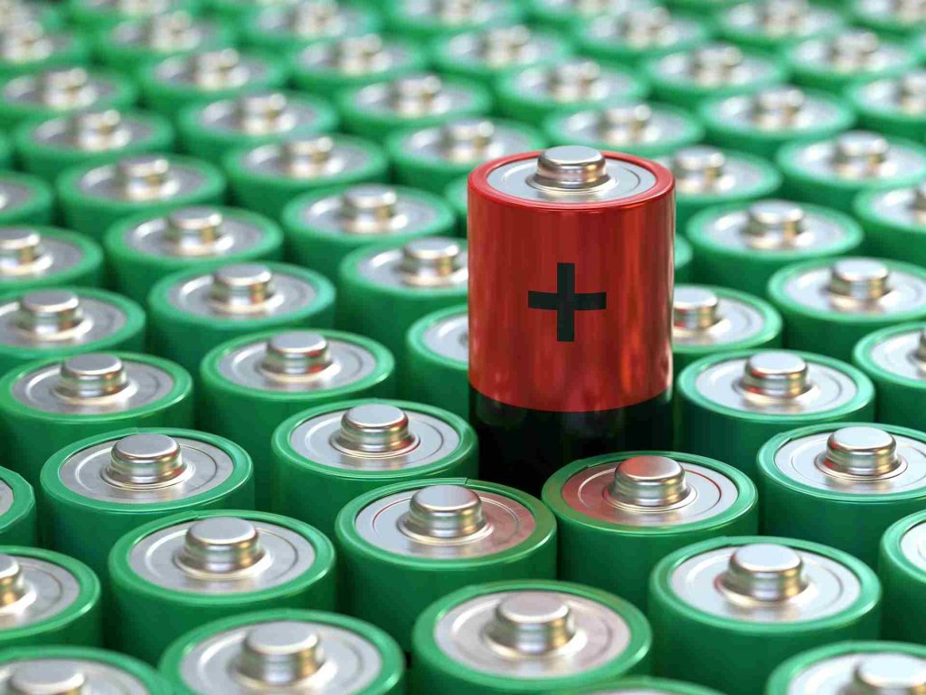 Vietnam Nickel Reserve Strategy: A single red battery with a plus sign stands out among rows of green batteries, emphasizing diversity in battery types.